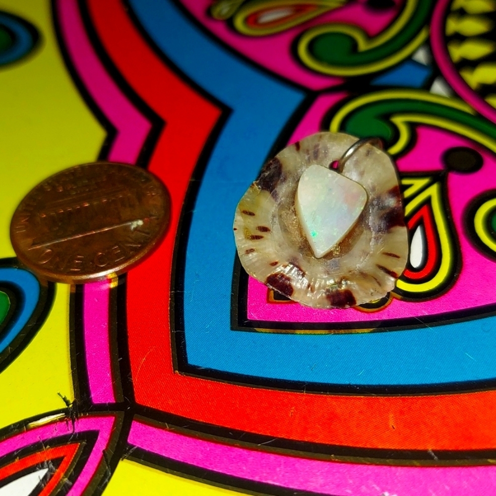 - Opal / shell bead!